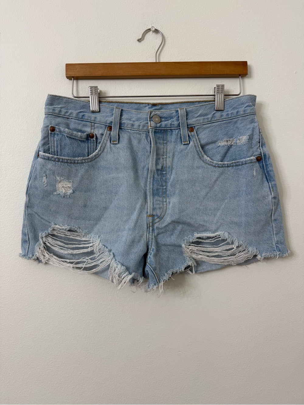 {31} Levi’s High-Rise Light Blue Distressed Denim Women’s Shorts